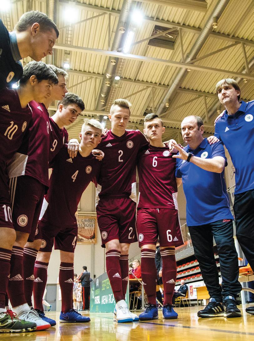 A UNIQUE OPPORTUNITY UNIKĀLA IESPĒJA Latvia coach Artūrs Šketovs (second right) addresses his squad Latvijas izlases galvenais treneris Artūrs Šketovs (otrais no labās) uzrunā savu komandu LATVIA ARE