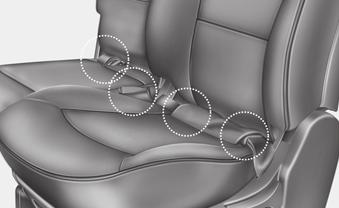 Vidējo drošības jostu var turēt, plāksni un audumu ietinot kabatā starp aizmugurējā sēdekļa atzveltni